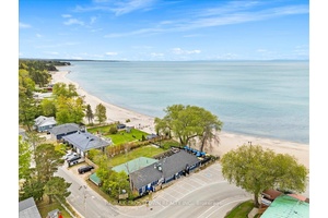 Rare opportunity to own a one of a kind waterfront property at 369 Balm Beach Rd W, ideally located on the sandy shores of Georgian Bay.