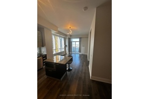 An exquisite corner residence situated in the vibrant heart of Yorkville.