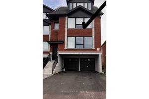 Enjoy modern living in this sleek and sophisticated townhouse.