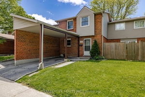 Welcome to this front facing 3 bedroom townhouse with a private carport and finished basement.