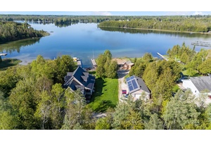Within the aqua coloured waters of Williams Lake on over a half acre lot, this exceptional lakefront property presents a true paradise for those seeking waterfront living.