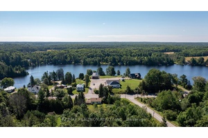 Modern Country Living ! Fully Renovated Bungalow with 4 Season Access in the Heart of Cottage Country !