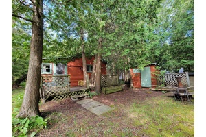 Cute as a button this classic, rustic, cottage in the higher end, desirable, and sought after Pine Tree Harbour community could be your ideal escape from the city.