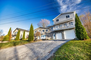 Welcome to this stunning two story, three bedroom home boasting breathtaking, unobstructed western views of Lake Scugog.