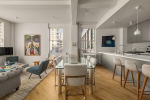 Located in the heart of prime Chelsea, this classic downtown one bedroom loft with a generously sized home office seamlessly blends pre war charm with modern sophistication.