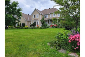 This stunning modern traditional home is set on 2.