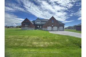 Welcome to this stunning, brand new stone bungalow, nestled on an expansive lot that offersluxury living and endless possibilities.