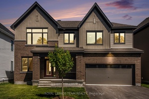 Stunning 4 Bedroom Home with Loft, Den amp ; Finished Basement on a Premium 50 Foot Lot !