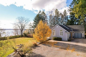 One Of A Kind Double Size Lot With Unobstructed South Facing Lake Views !