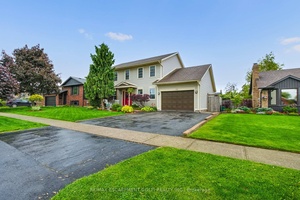 Welcome to your dream family home nestled on a serene, tree lined street with undeniable curb appeal.