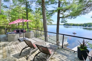 MOSTLY FURNISHED amp ; TURN KEY Welcome to your lakeside escape on picturesque Sparrow Lake, where boating adventures await with direct access to the renowned Trent Severn Waterway.