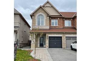 End Unit Freehold Executive Town Home Built By Minto Boasts 9Ft Ceilings, Dark Hardwood On Main And Upper Hall, Dark Stained Oak Circular Staircase, Wrought Iron Pickets, Taller Uppers Kitchen ...