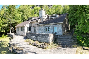 Known as the Rock House, this distinctive and remarkable two story stone cottage, has served as a family retreat for generations.