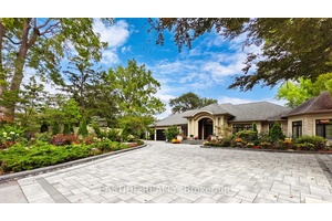 Welcome to 431 Fourth Line a once in a lifetime opportunity to own a palatial custom built bungalow on a sprawling 0.