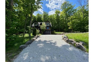 Log Cabin Gorgeous 3 bedroom 3 bathroom Chalet on a large deep lot with views of Georgian Bay.