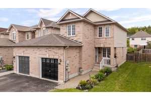 Spacious turn key end unit townhouse in a quiet, family friendly neighbourhood with NO extra fees and NO shared interior walls connected only by the garage.