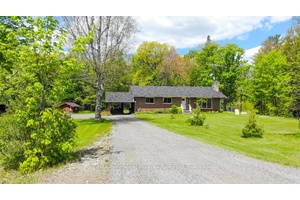 Nestled on nearly 5 private acres surrounded by mature trees, this charming 3 bedroom, 1 bath brick bungalow offers peace and privacy in Magnetawan.