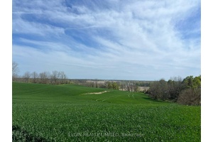 Two houses on 49 acres. Discover this rare gem, perfectly situated just minutes from St.