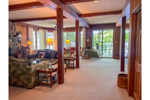 An exceptional opportunity to cottage this summer on 390 feet of pristine shoreline on Lake Rosseau, just minutes from the heart of Port Carling.