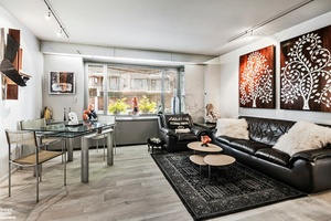 Tranquil garden views. This designer 1bed, 1bath has a renovated kitchen with lacquered white cabinets, Italian porcelain floors, granite counter tops and stainless steel appliances.