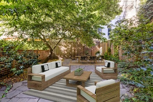 Extremely rare opportunity to acquire a private garden home in the heart of Hudson Square.