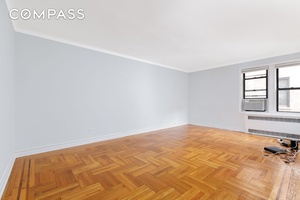 221 East 18th Street Unit 5F is a well thought out 5th floor apartment that offers a functional layout, an abundance of sunlight, and unique pre war details.