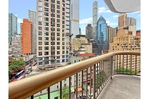 Make this elegant corner residence your new home in the heart of Lenox Hill !