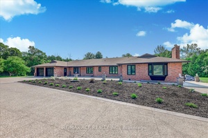 Welcome to this exquisite custom built bungalow, nestled on a sprawling 2.