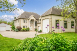 Discover exceptional living in this stunning custom built home featuring ICF Insulated Concrete Form construction for unmatched energy efficiency and durability, perfectly situated on 2 private acres in the desirable ...