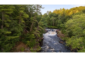 ONCE IN A LIFETIME OPPORTUNITY WITH PRIVATE WATERFALL !