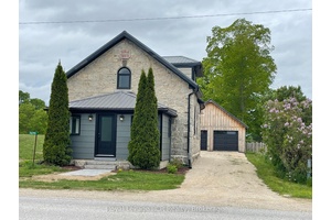 1877 converted Schoolhouse with detached double garage.