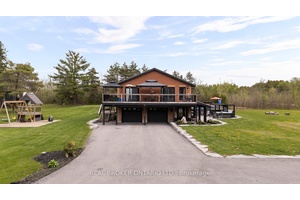 COUNTRY LIVING WITH LAKESIDE CHARM !