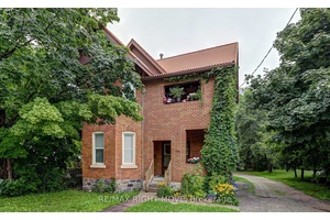 Updated all brick legal Triplex within close walking distance to Soldiers Memorial Hospital and Downtown.