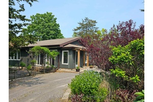 Nestled on a serene and peaceful property, this spacious bungalow offers a perfect blend of tranquility and comfort.