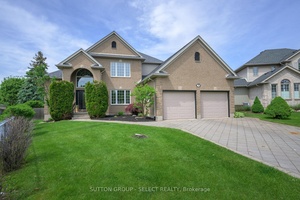 Extensively renovated home in one of North London's most desirable school districts, nestled on a quiet, mature cul de sac in the sought after Masonville P.