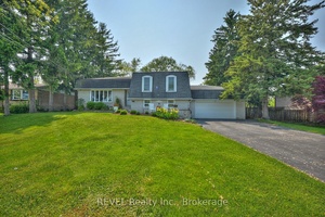 Welcome to this fantastic four level side split, nestled on an oversized lot in desirable Crescent Park !