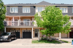 Beautifully upgraded freehold townhome offering exceptional value just steps to top rated Milton schools.