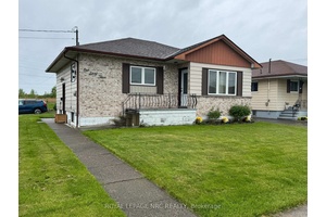 This solid three bedroom bungalow sits at the end of a quiet street, backing directly onto the scenic Canal Trail perfect for those who appreciate nature right outside their door.