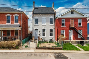 This charming multi level home offers exceptional space and flexibility, making it ideal for both a large family or a potential duplex conversion.