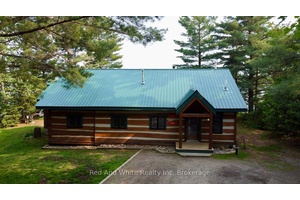 Welcome to the Lakehouse a year round off Grid, south facing, log home or cottage, nestled on the quiet shores of Meadow Lake aka Meads Lake.
