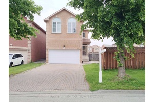 Spacious end unit property offering enhanced privacy and side yard access.