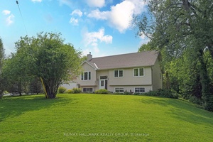 Hidden Gem in Fitzroy Harbour You'd never guess from the street the magical oasis that awaits behind this charming Hi Ranch bungalow tucked away on a quiet dead end street ...