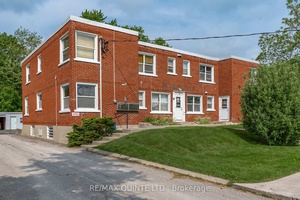 Welcome to 54 Sidney Street a cash flowing, turnkey 12 unit all brick multiplex located in Belleville's desirable west end.