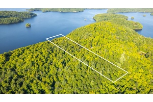 Discover the tranquil allure of Redstone Lake with this remarkable 18.