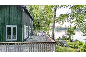 Welcome to your Eagle Lake getaway 230 feet of shoreline, two separate lots, and a peaceful setting with open water views and good privacy from the neighbours.