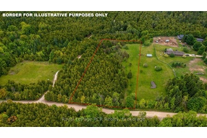 Beautiful 3 acre building lot, perfectly nestled among mature pine and cedar trees with the balance in gently rolling pasture land.