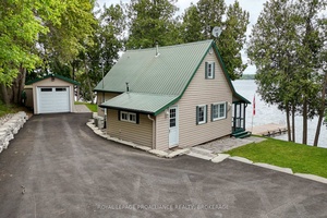 Exceptional waterfront retreat on highly sought after Loughborough Lake.