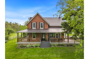 Welcome to 3062 Town Line a picturesque Hallmark style century home set on a scenic 2.