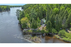 Idyllic Post and Beam Waterfront Cottage on the Ottawa River a fairytale like property nestled on 5.