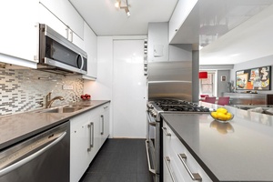 SPRAWLING RENOVATED 3 BEDROOM, 2 BATH HOME HOME OFFICE WITH GREAT OPEN FLOORPLAN AT A TERRIFIC PRICE !
